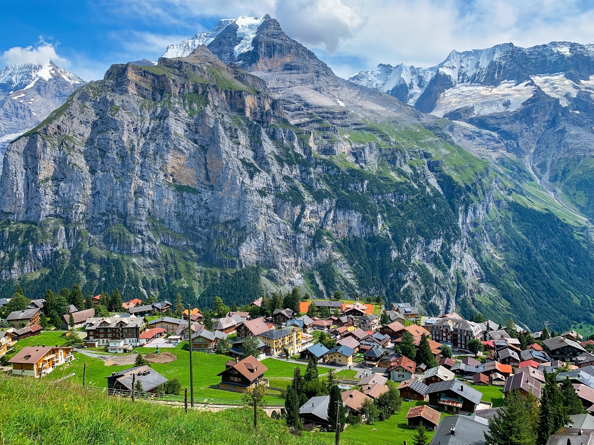 Swiss alpine village in the mountains in Switzerland. Beautiful landscape.